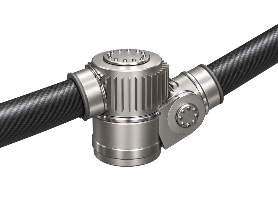 Close view of one of the three elbow modules, where two carbon links meet at a finned actuator drum